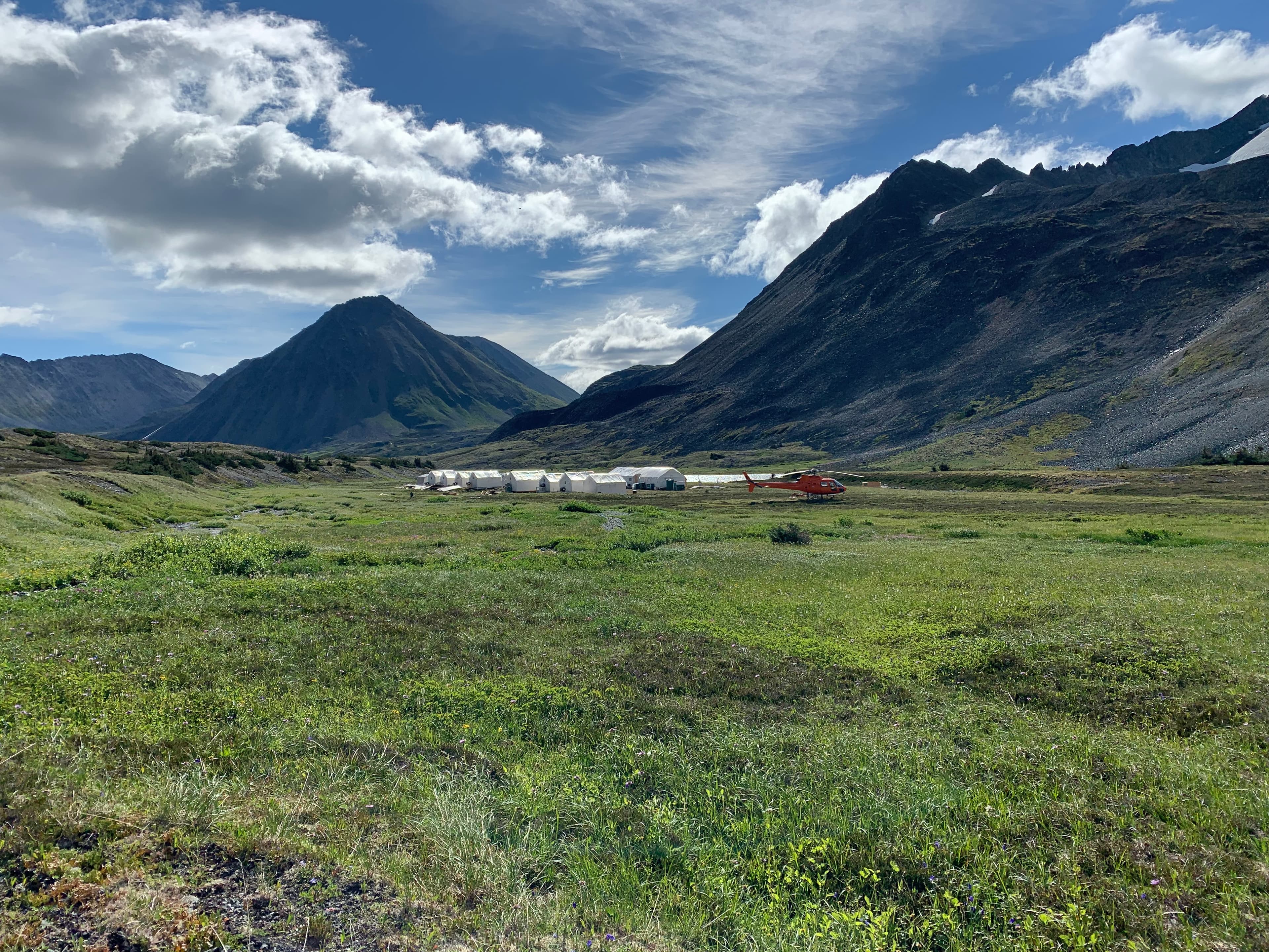 Pacific Ridge's exploration camp and helicopter in the mountains of northern British Columbia
